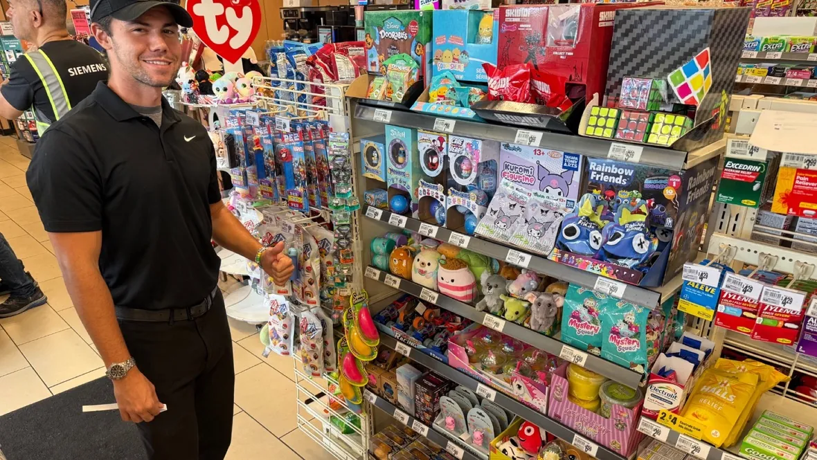 An XPRS rep beside a section he merchandised